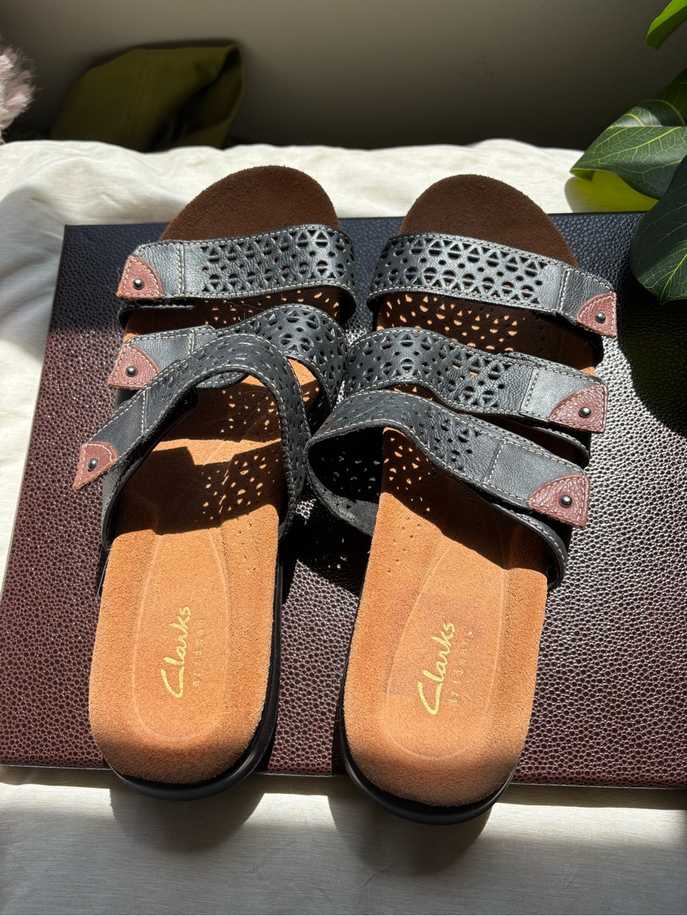 Clarks Black Laser-Cut Triple Strap Slide Sandals with Brown Insole